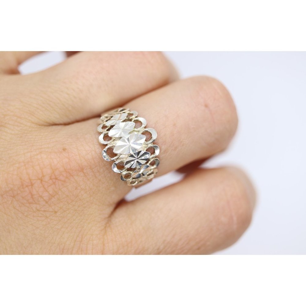 Diamond cut Sterling silver ring. Beverly Hills Silver band